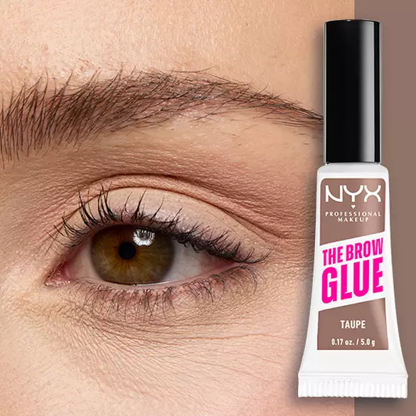 Close-up of an eye and brow with NYX Professional Makeup The Brow Glue Instant Brow Styler in Taupe shown beside the brow for a softly tinted, brushed-up finish.