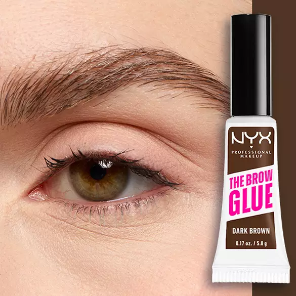 Close-up of an eye and brow with NYX Professional Makeup The Brow Glue Instant Brow Styler in Dark Brown shown beside the brow for a defined, brushed-up finish.