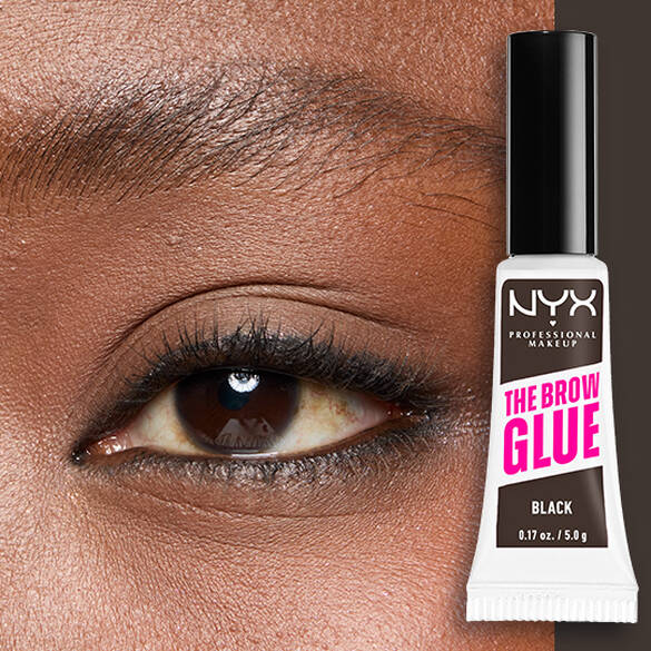 Close-up of an eye and brow with NYX Professional Makeup The Brow Glue Instant Brow Styler in Black shown beside the brow for a bold, brushed-up finish..